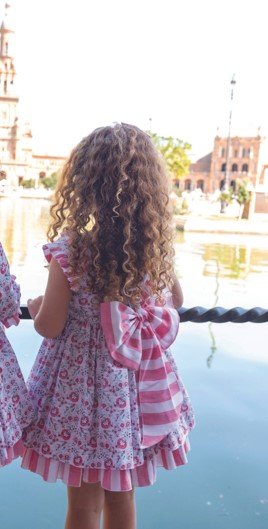 Vestido de vestir, con estampado floral en tonos rosas, y escote en espalda,para niña Dbb collection